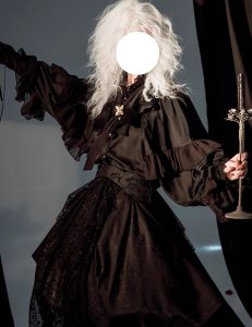 the lolita shirt from the dragon bone cemetery is worn inside with a gothic prince outfit
