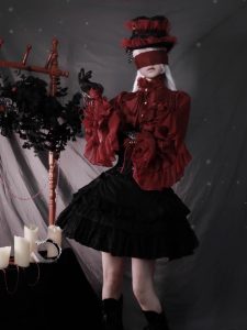 the lolita shirt from the dragon bone cemetery is worn inside with a gothic prince outfit