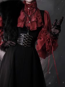 the lolita shirt from the dragon bone cemetery is worn inside with a gothic prince outfit