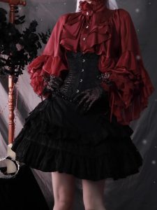 the lolita shirt from the dragon bone cemetery is worn inside with a gothic prince outfit