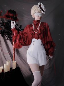 the lolita shirt from the dragon bone cemetery is worn inside with a gothic prince outfit