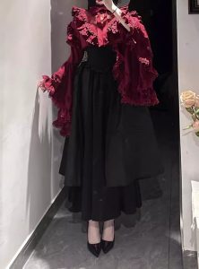 a gorgeous and elegant young lady in a black and red gothic style lolita dress, shirt and sleeve suit